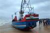 Udupi: Sunken Malpe-registered fishing boat drifts ashore at Uchila Beach